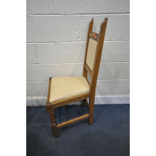 1307 - TERRY 'RAM MAN' HARRINGTON, A SET OF SEVEN SOLID OAK DINING CHAIRS, with cream leather back rest and... 