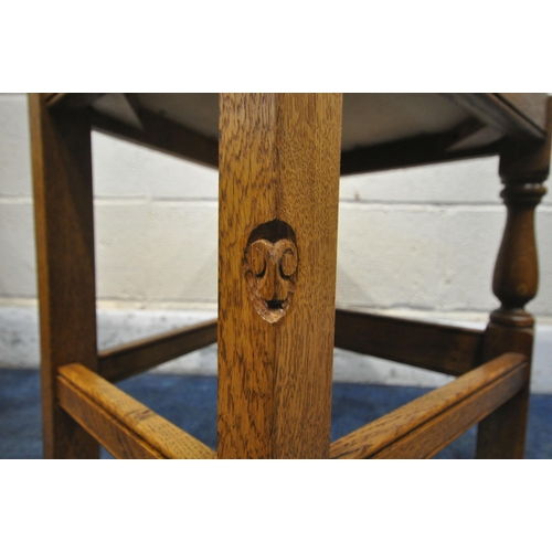 1307 - TERRY 'RAM MAN' HARRINGTON, A SET OF SEVEN SOLID OAK DINING CHAIRS, with cream leather back rest and... 