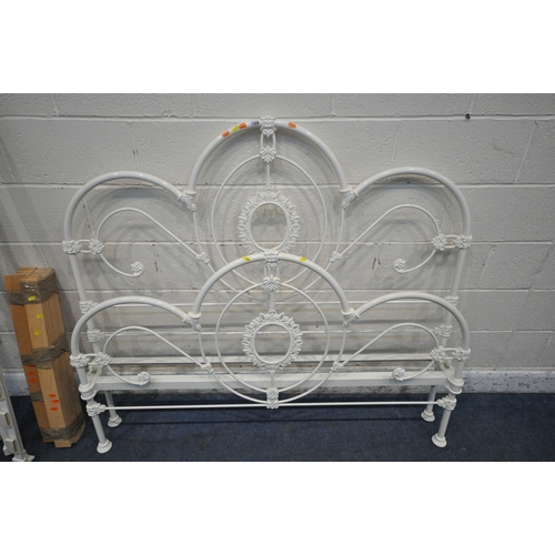 1308 - A WHITE PAINTED TUBULAR METAL 4FT6 BEDSTEAD, with side rails, slats and central support (condition r... 