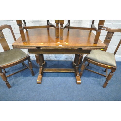 1323 - AN EARLY 20TH CENTURY OAK DRAW LEAF DINING TABLE, raised on bulbous turned supports, shaped feet, un... 