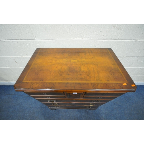 1327 - A LATE 20TH CENTURY WALNUT MEDIA CABINET, with a hide and fall door, above a fall front door, width ... 