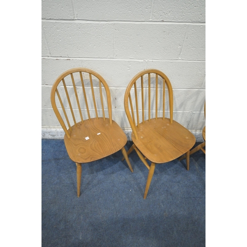 1333 - LUCIAN ERCOLANI, A MID CENTURY ERCOL ELM AND BEECH GRAND WINDSOR EXTENDING DINING TABLE, with a bi-f... 