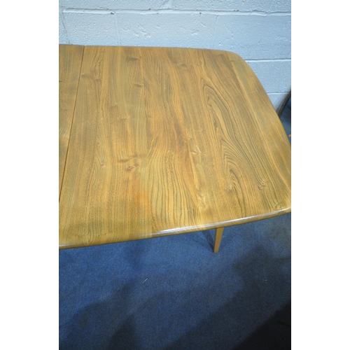 1333 - LUCIAN ERCOLANI, A MID CENTURY ERCOL ELM AND BEECH GRAND WINDSOR EXTENDING DINING TABLE, with a bi-f... 