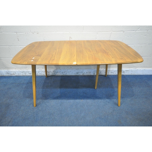 1333 - LUCIAN ERCOLANI, A MID CENTURY ERCOL ELM AND BEECH GRAND WINDSOR EXTENDING DINING TABLE, with a bi-f... 