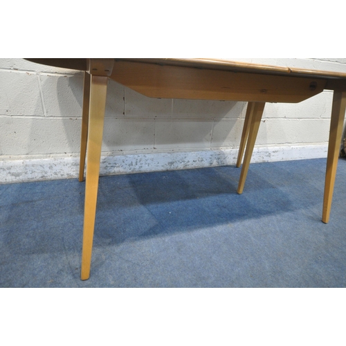 1333 - LUCIAN ERCOLANI, A MID CENTURY ERCOL ELM AND BEECH GRAND WINDSOR EXTENDING DINING TABLE, with a bi-f... 