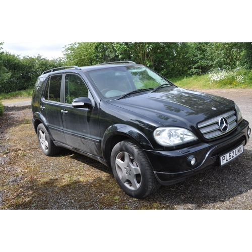 1001 - A 2002 MERCEDES ML55 AMG AUTO SUV CAR in black with 5439cc V8 petrol engine, automatic gearbox, firs... 