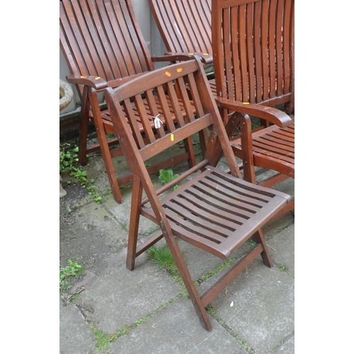 1010 - A SET OF THREE FOLDING HARDWOOD GARDEN CARVER CHAIRS and a similar folding chair (4)