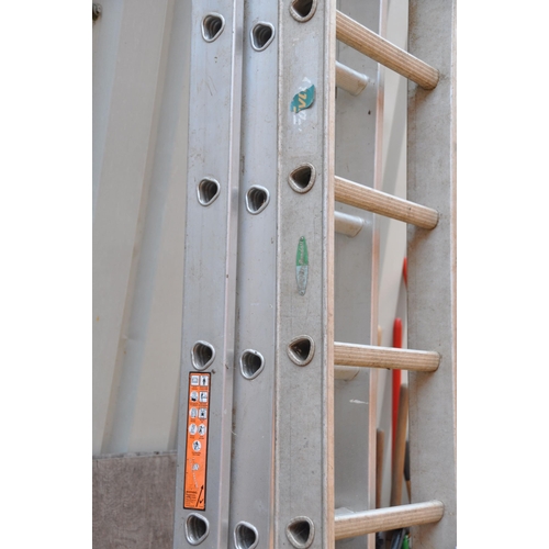 1014 - A LFI ALUMINIUM DOUBLE EXTENSION LADDER AND A SINGLE LADDER extension has 17rungs to each 450cm leng... 