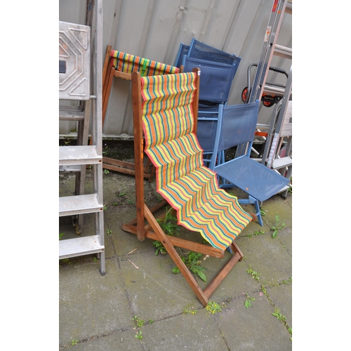 1019 - A PAIR OF VINTAGE DECK CHAIRS with hardwood frames and striped woven plastic seats along with four m... 