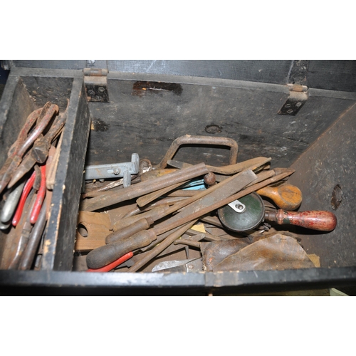 1064 - TWO VINTAGE WOODEN TOOL CHESTS CONTAINING TOOLS including spanners, files, mallets, pliers and snips... 