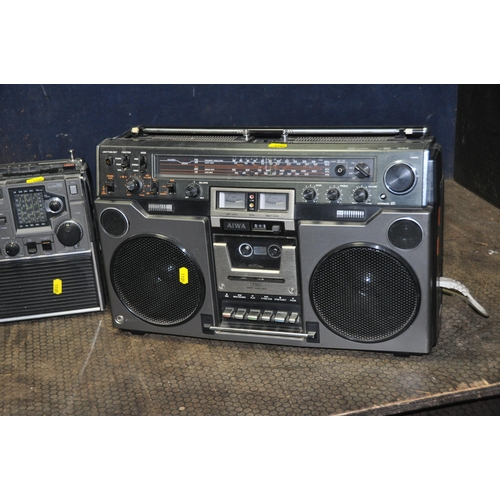 1105 - THREE VINTAGE PORTABLE HI FIS comprising of an Aiwa TPR-950, an Aiwa TPR-250 (both tape players not ... 