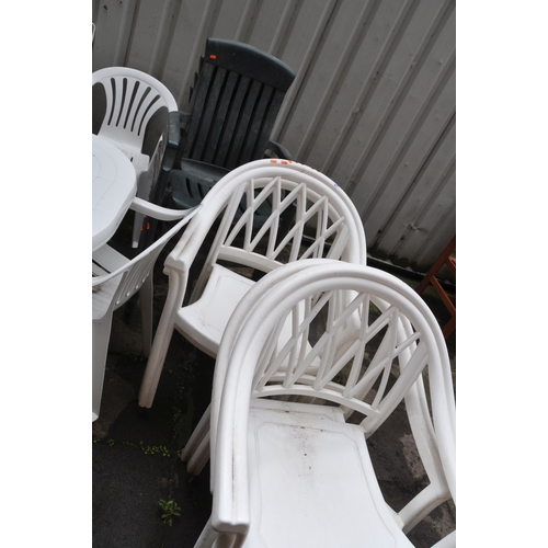 1026 - A LARGE COLLECTION OF PLASTIC GARDEN FURNITURE including a rectangular table 138cm long, two pairs o... 