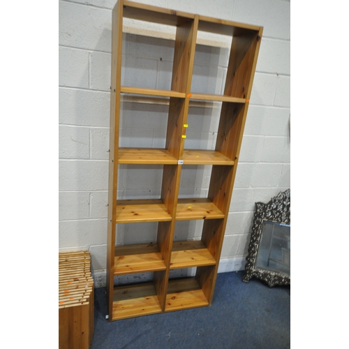 1198 - A SELECTION OF PINE SHELVING SYSTEMS, with an arrangement of fifty-seven shelves (condition report: ... 