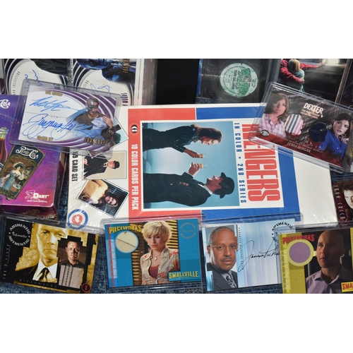 467 - FOUR BOXES OF TRADING CARDS, to include autographed cards: James Pickens Jr, Nicholas Lea, Bruce Har... 