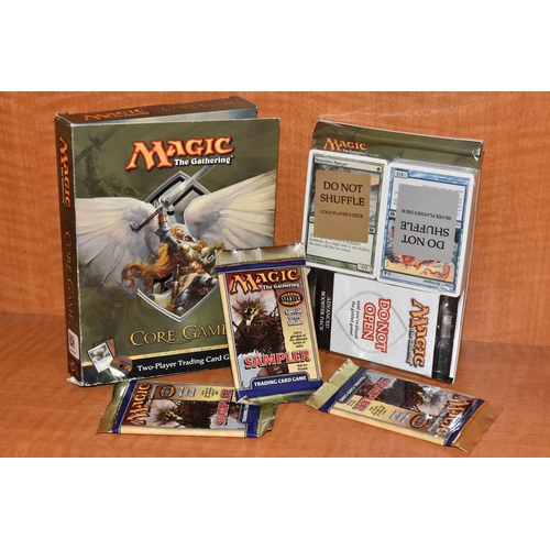 489 - MAGIC THE GATHERING CORE GAME BOXED AND THREE SAMPLER BOOSTER PACKS, all three booster packs are sea... 