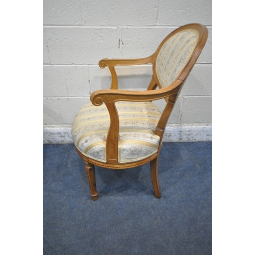 1208 - A PAIR OF 20TH CENTURY ASH ARMCHAIRS, with an oval backrest, swept open armrests, raised on fluted a... 