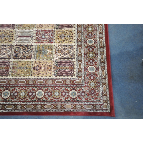 1210 - A LARGE RECTANGULAR VALBY RUTA RUG, with forty-five central decorative squares, surrounded by a mult... 