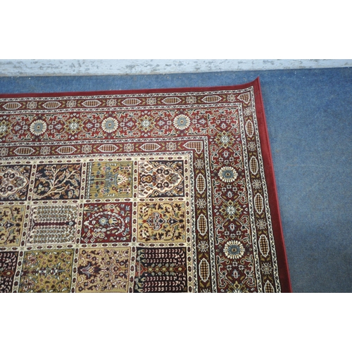 1210 - A LARGE RECTANGULAR VALBY RUTA RUG, with forty-five central decorative squares, surrounded by a mult... 