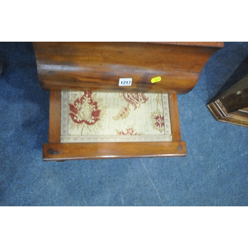 1217 - A VICTORIAN MAHOGANY COMMODE, the hinged lid enclosing a ceramic pot, a pull out foot rest, raised o... 