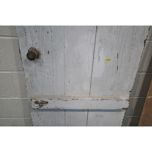 1236 - TWO PINE DOORS, one painted white, largest width 68cmx  height 183cm (condition report: historical w... 