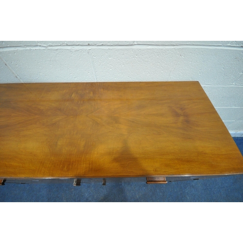 1238 - A LATE 20TH CENTURY WALNUT SIDEBOARD, fitted with two drawers, above double cupboard doors, width 13... 