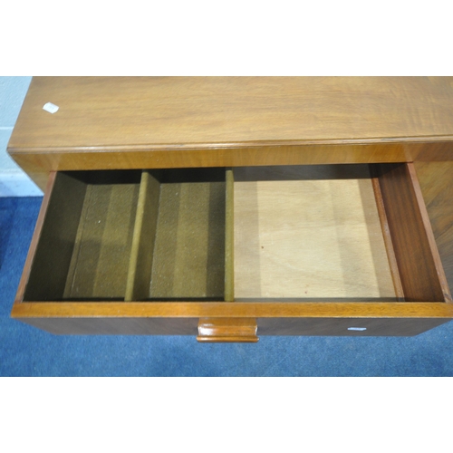 1238 - A LATE 20TH CENTURY WALNUT SIDEBOARD, fitted with two drawers, above double cupboard doors, width 13... 