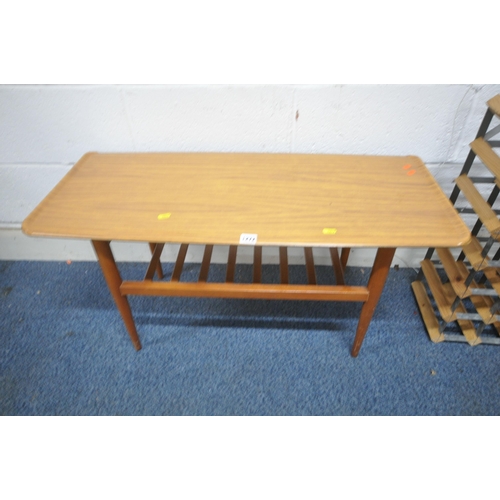 1272 - A MID CENTURY TEAK VENEER COFFEE TABLE, raised on cylindrical tapered legs, united by a slatted unde... 