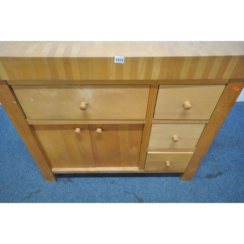 A FREESTANDING DOUBLE SIDED BEECH BUTCHERS BLOCK KITCHEN CABINET, with ...