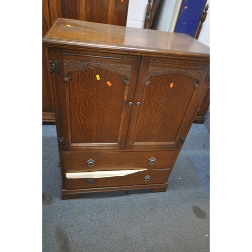 1285 - A 20TH CENTURY OAK FOUR PIECE BEDROOM SUITE, comprising a double door wardrobe, width 130cm x depth ... 