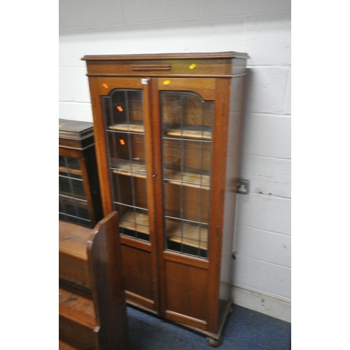 1288 - THREE 20TH CENTURY OAK BOOKCASES, two with lead glazed doors, one is a three tier waterfall open boo... 