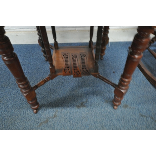 1293 - AN OCTAGONAL MAHOGANY CENTRE TABLE, raised on turned supports, ceramic castors, united by turned str... 