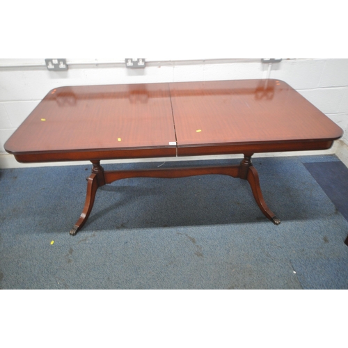 1309 - BERESFORD AND HICKS, A LATE 20TH CENTURY MAHOGANY EXTENDING DINING TABLE, raised on turned supports,... 