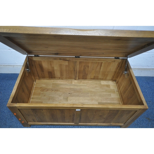 1316 - A SOLID OAK BLANKET CHEST, with a hinged lid, width 110cm x depth 58cm x height 49cm (condition repo... 