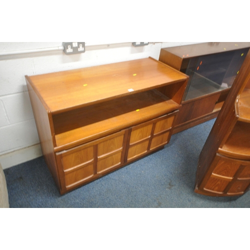 1318 - A SELECTION OF MID CENTURY TEAK FURNITURE, to include a bookcase with double glass sliding doors, ab... 