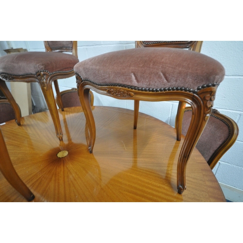 1327 - A LARGE 20TH CENTURY MAHOGANY CIRCULAR TABLE, raised on four turned supports, splayed legs with bras... 