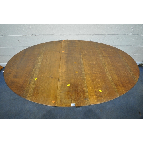 1330 - RUPERT GRIFFITHS, A 20TH CENTURY SOLID OAK OVAL GATE LEG TABLE, raised on block and turned legs, uni... 