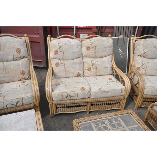 1338 - A WICKER EIGHT PIECE CONSERVATORY SUITE, comprising a two seater sofa, length 123cm x depth 90cm x h... 