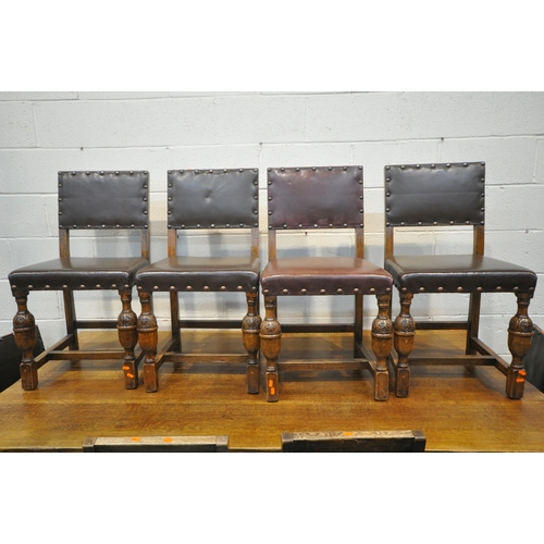 1347 - A LARGE 20TH CENTURY OAK RECTANGULAR TABLE, raised on twin bulbous supports, shaped feet, united by ... 