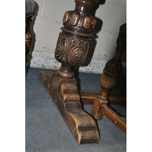 1347 - A LARGE 20TH CENTURY OAK RECTANGULAR TABLE, raised on twin bulbous supports, shaped feet, united by ... 