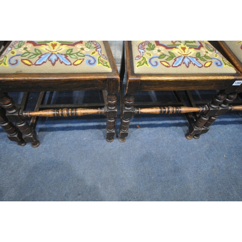 1355 - A SET OF FOUR 20TH CENTURY OAK CHAIRS, with beige and foliate drop in seat pads, along with a pair o... 