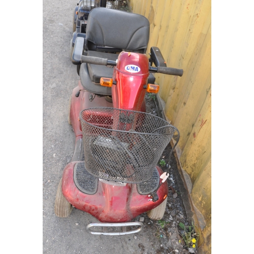 1002 - A DMA FOUR WHEELED MOBILITY SCOOTER(no key so untested) with power supply