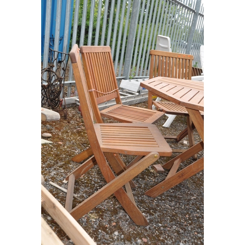 1007 - A MODERN HARDWOOD FOLDING TABLE AND SIX CHAIRS badged FWT to all the octagonal table is 120cm across... 