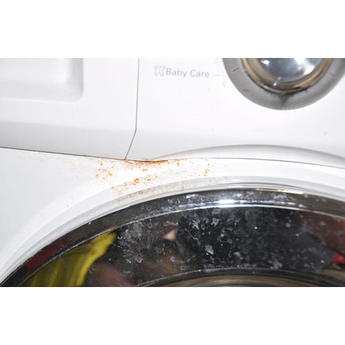 1073 - A LG F1496AD WASHER DRYER width 60cm depth 60cm height 85cm (PAT pass, spin cycle run but not tested... 