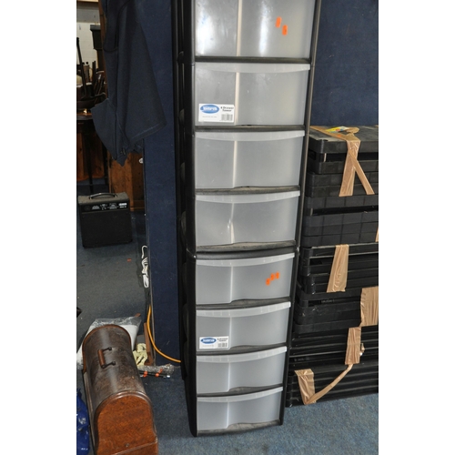 1090 - ELEVEN PLASTIC SHELVING UNITS with four levels and pipe work to each width 60cm depth 30cm, along wi... 