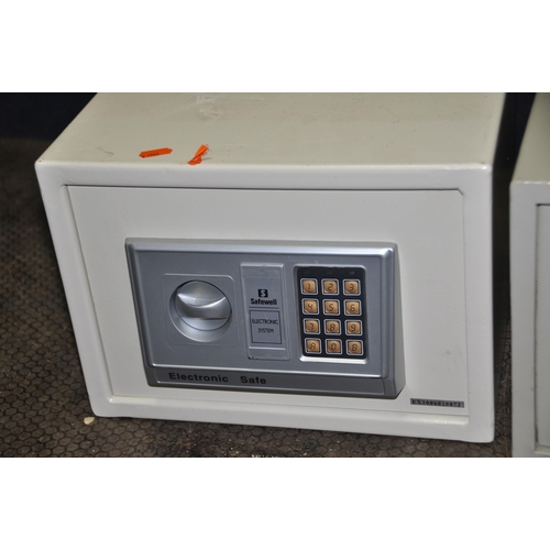 1100 - TWO ELECTRONIC PERSONAL SAFES one by Safewell (open, batteries removed but no key) and the other unb... 