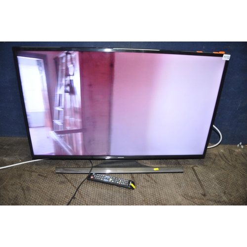 1112 - A SAMSUNG UE40JU6400K 40in UHD SMART TV WITH REMOTE