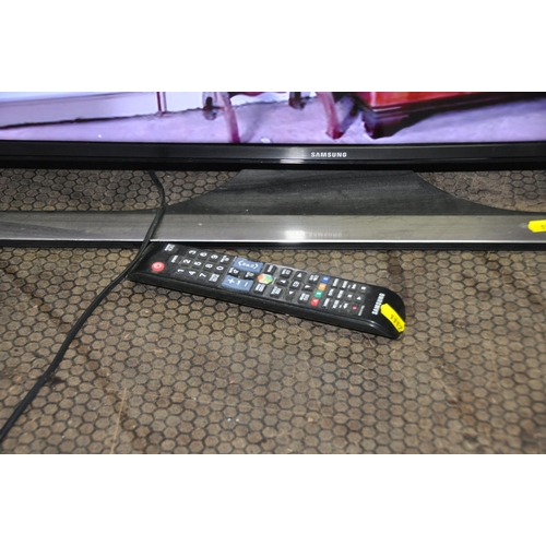 1112 - A SAMSUNG UE40JU6400K 40in UHD SMART TV WITH REMOTE