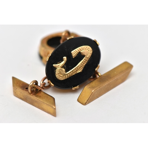 1 - A PAIR OF 9CT GOLD AND ONYX CUFFLINKS, each designed with an oval onyx panel in a double six claw se... 