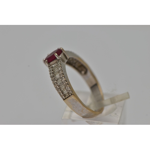 11 - A GEM SET RING, an oval cut ruby in a prong setting, flanked with baguette and round brilliant cut d... 