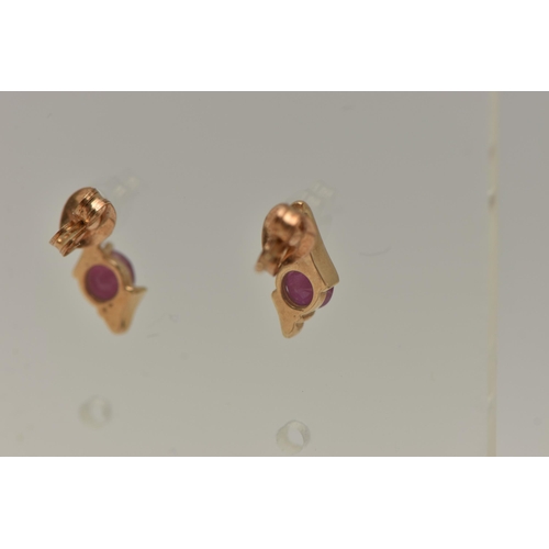 18 - TWO PAIRS OF GEM SET EARRINGS, the first a pair of yellow gold ruby earrings, fitted with post and s... 